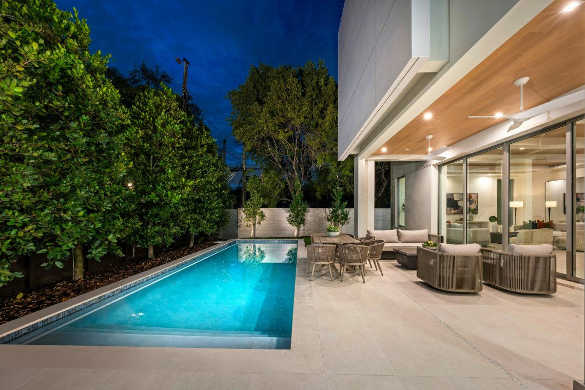 modern backyard featuring a patio and a swimming pool