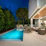 modern backyard featuring a patio and a swimming pool