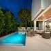 modern backyard featuring a patio and a swimming pool